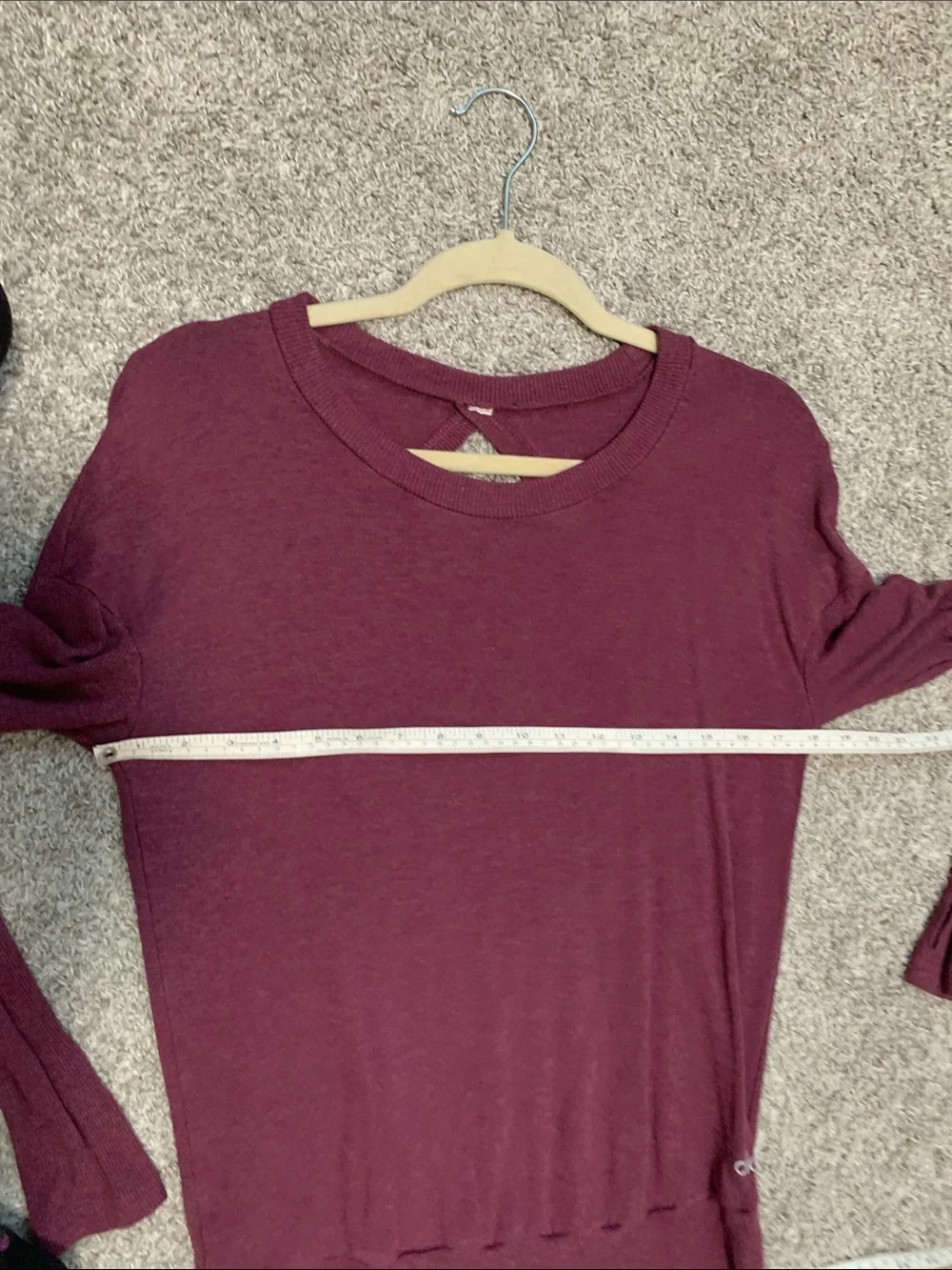 Alo Yoga Intricate Long-Sleeve Cut Out Back Crewneck Top in Wine